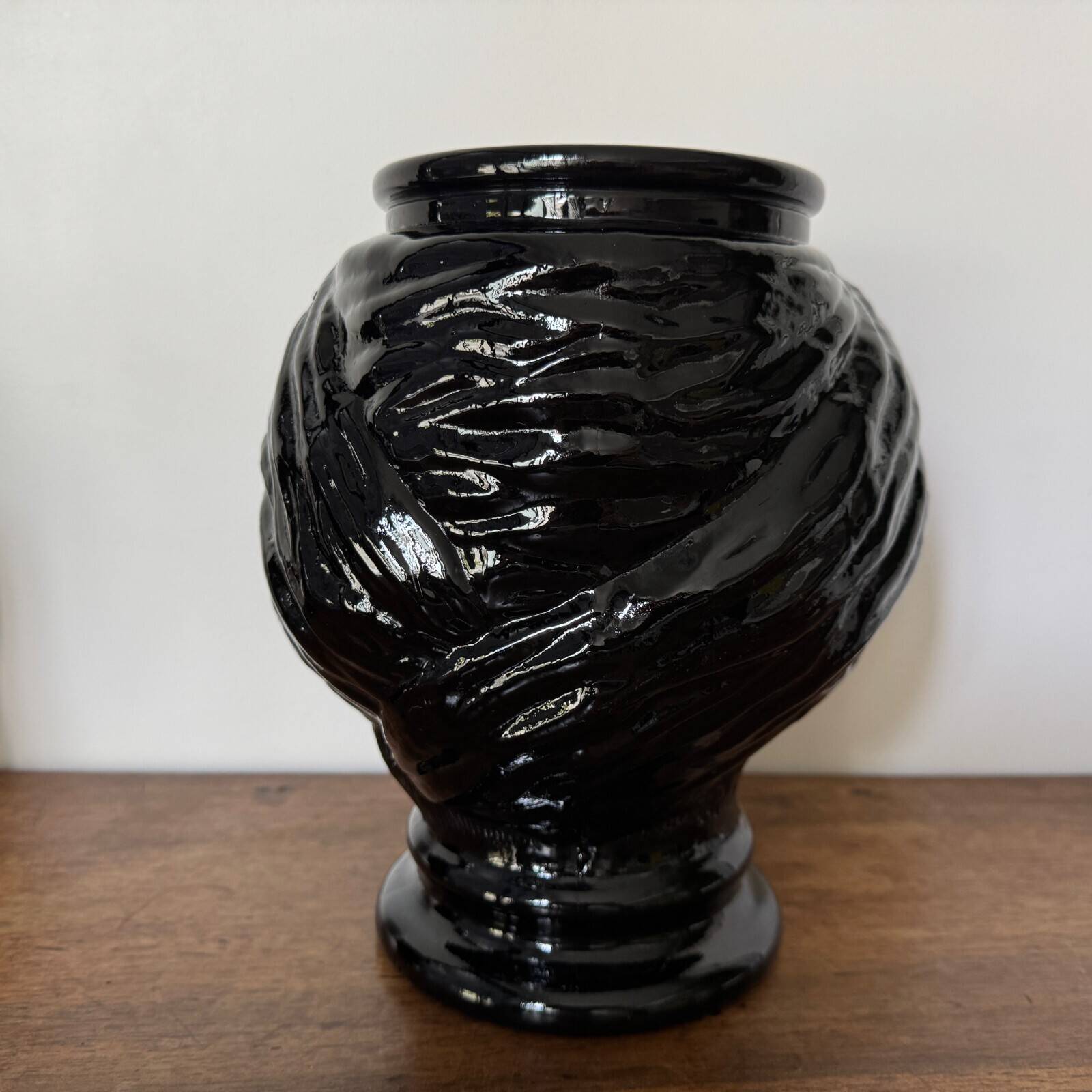 2 glass heads representing Moors