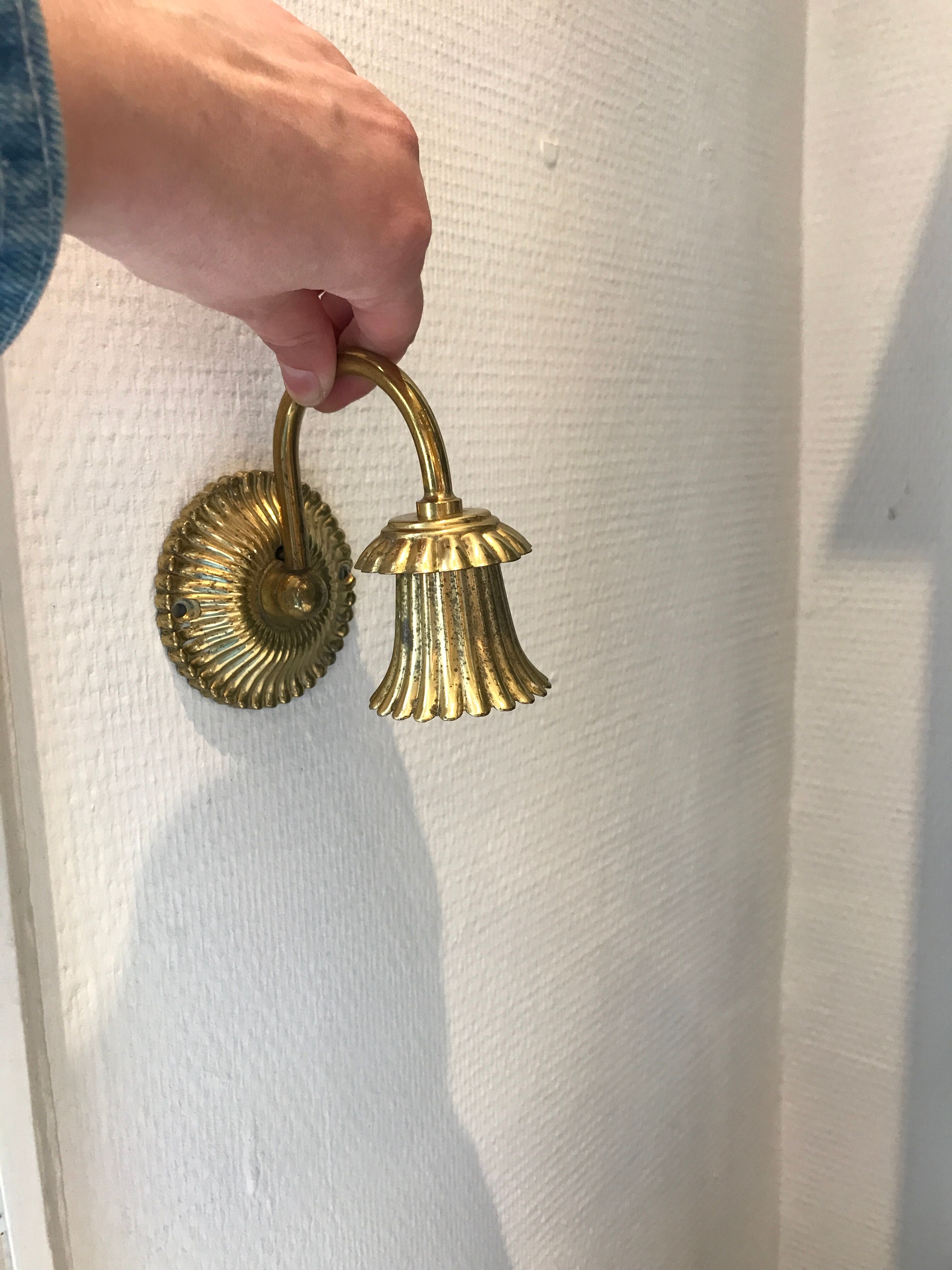Pair of golden wall light