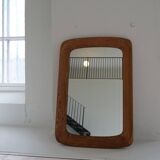 Mid-century modern sculptural wall mirror in stained oak, glass, Glas & Trä 1959