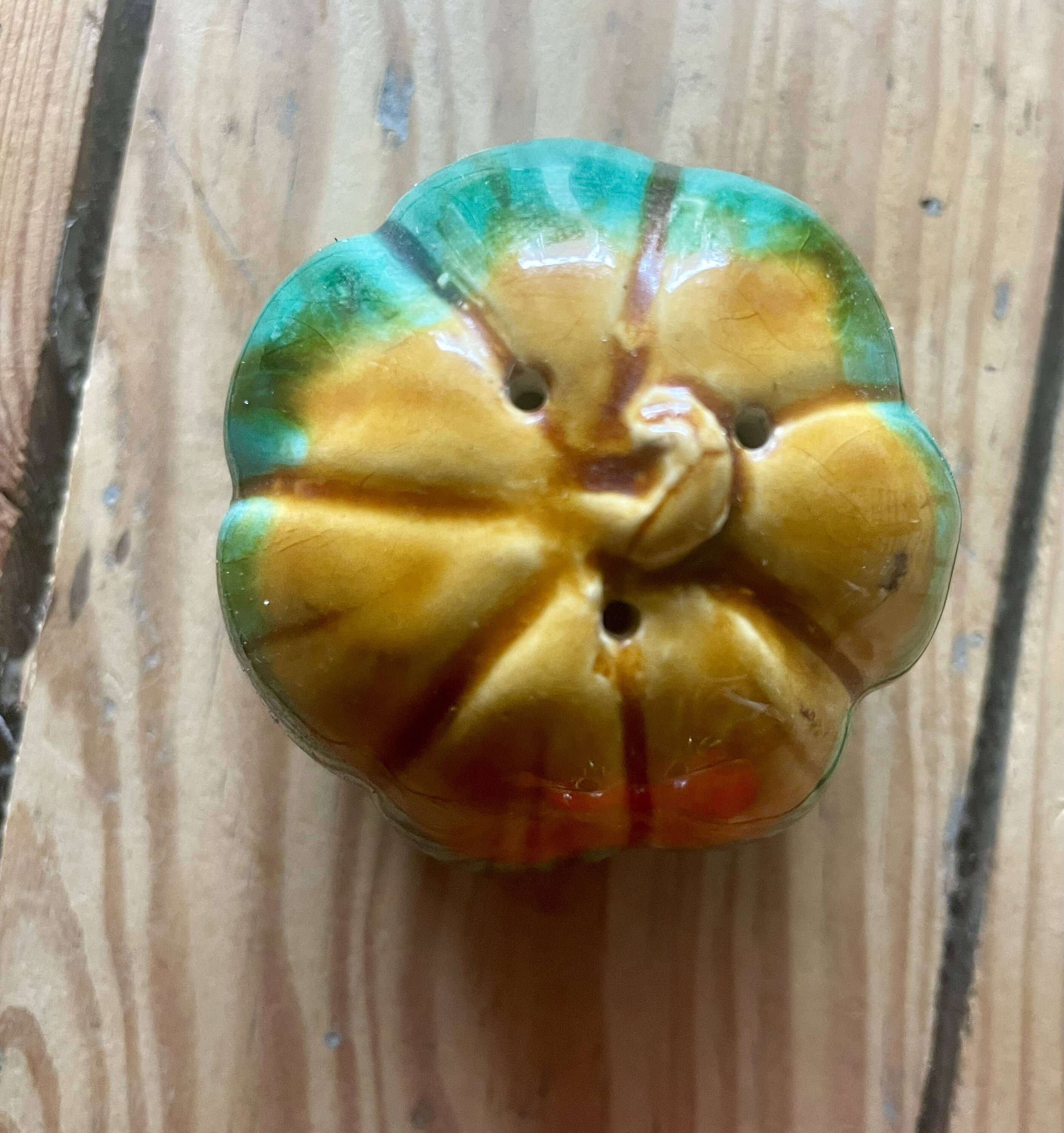 Set of mustard pots and salt shakers in slip