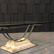 Table basse fer et verre patine antique