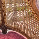 Louis XV style walnut and cane armchair