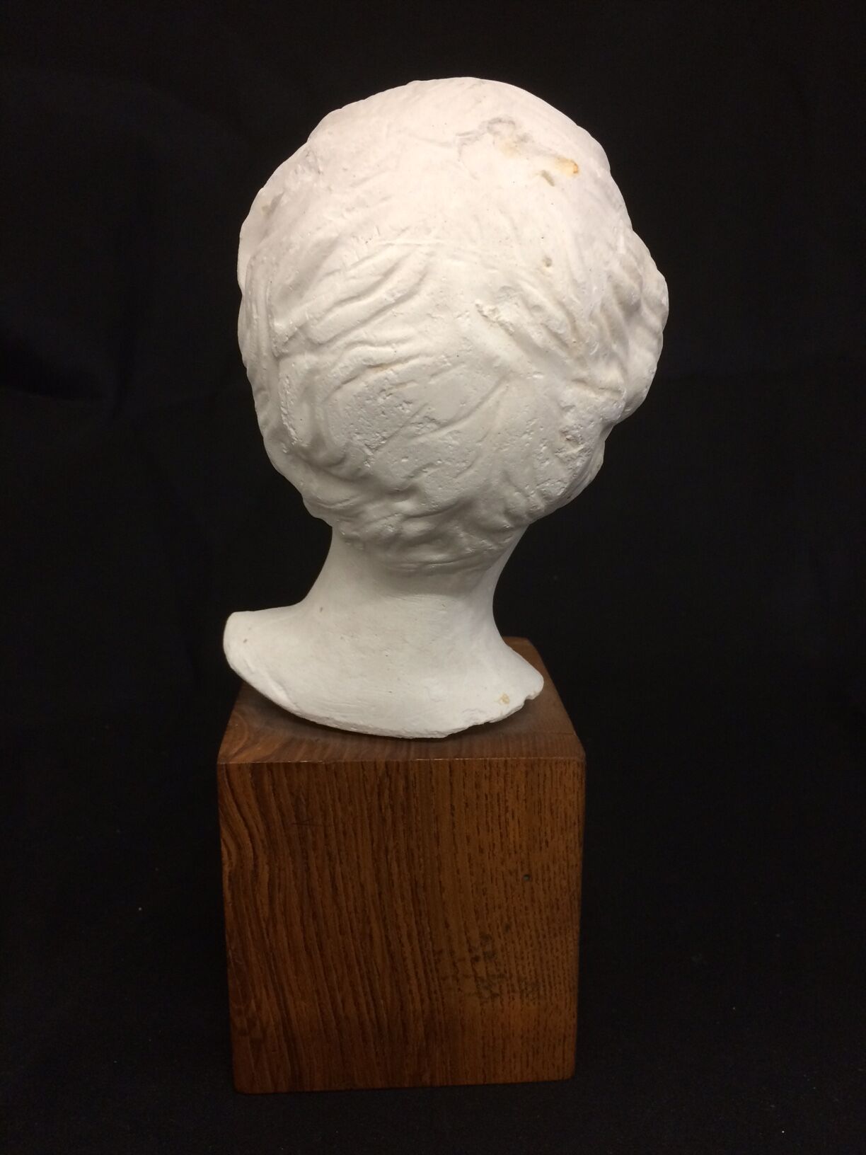 Decorative head in plaster