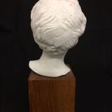 Decorative head in plaster