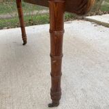 Louis Philippe 19th century square table with shutters in solid oak wood on casters