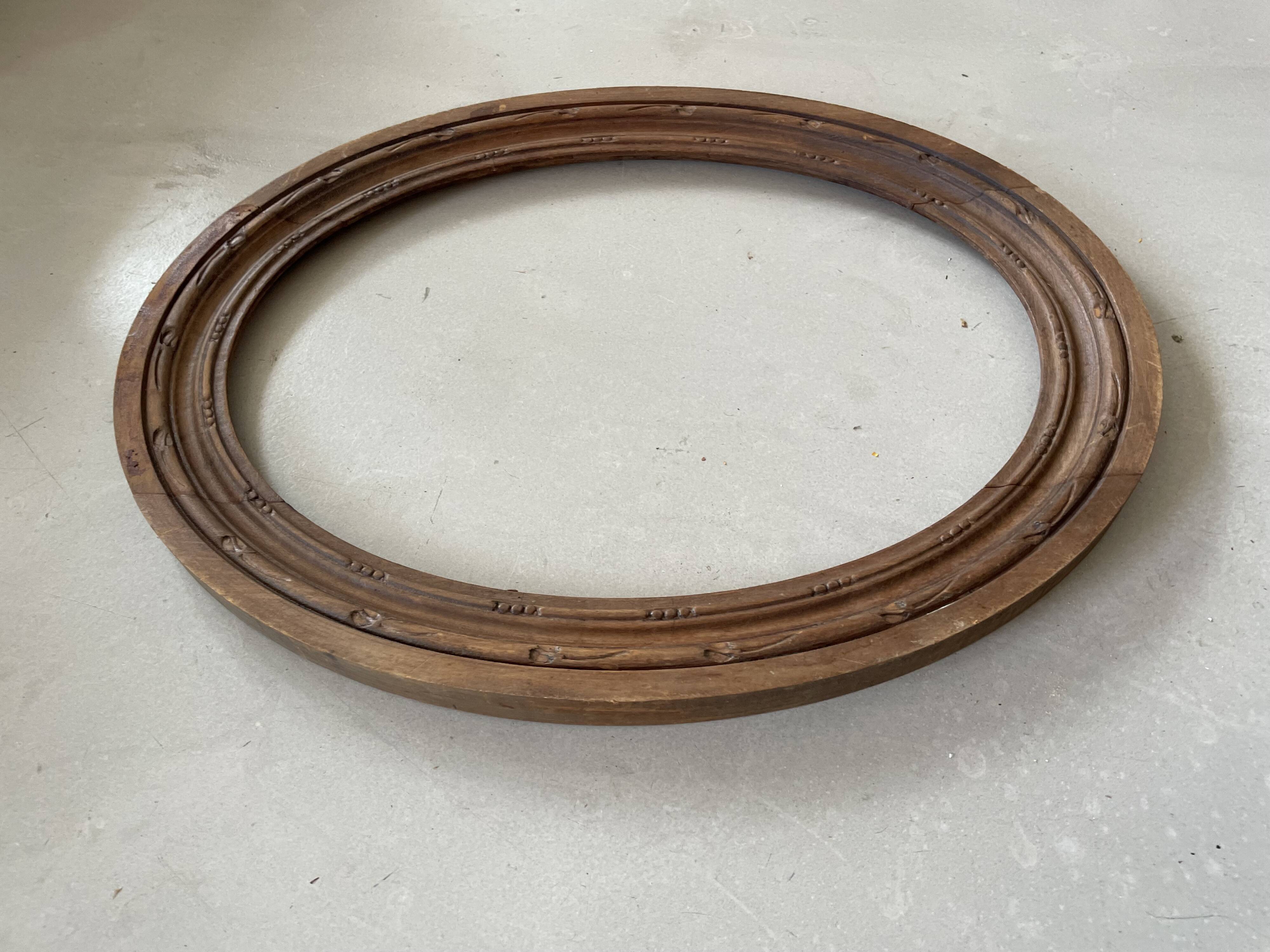 Oval old wooden frame