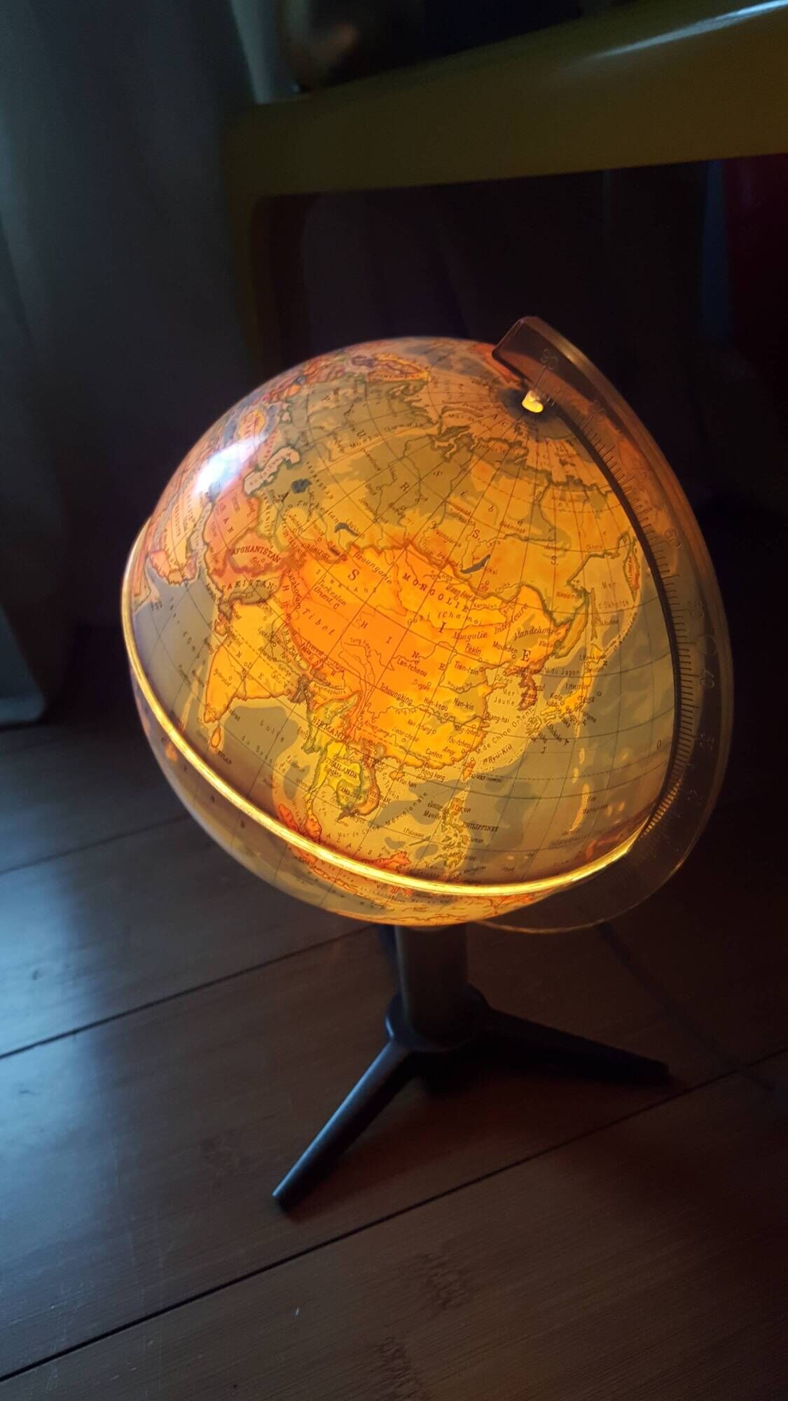 Bright vintage Earth globe brand Vulliermes with metal tripod foot
