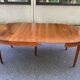 Round extendable dining table Louis XVI in cherry wood from the 1960s.