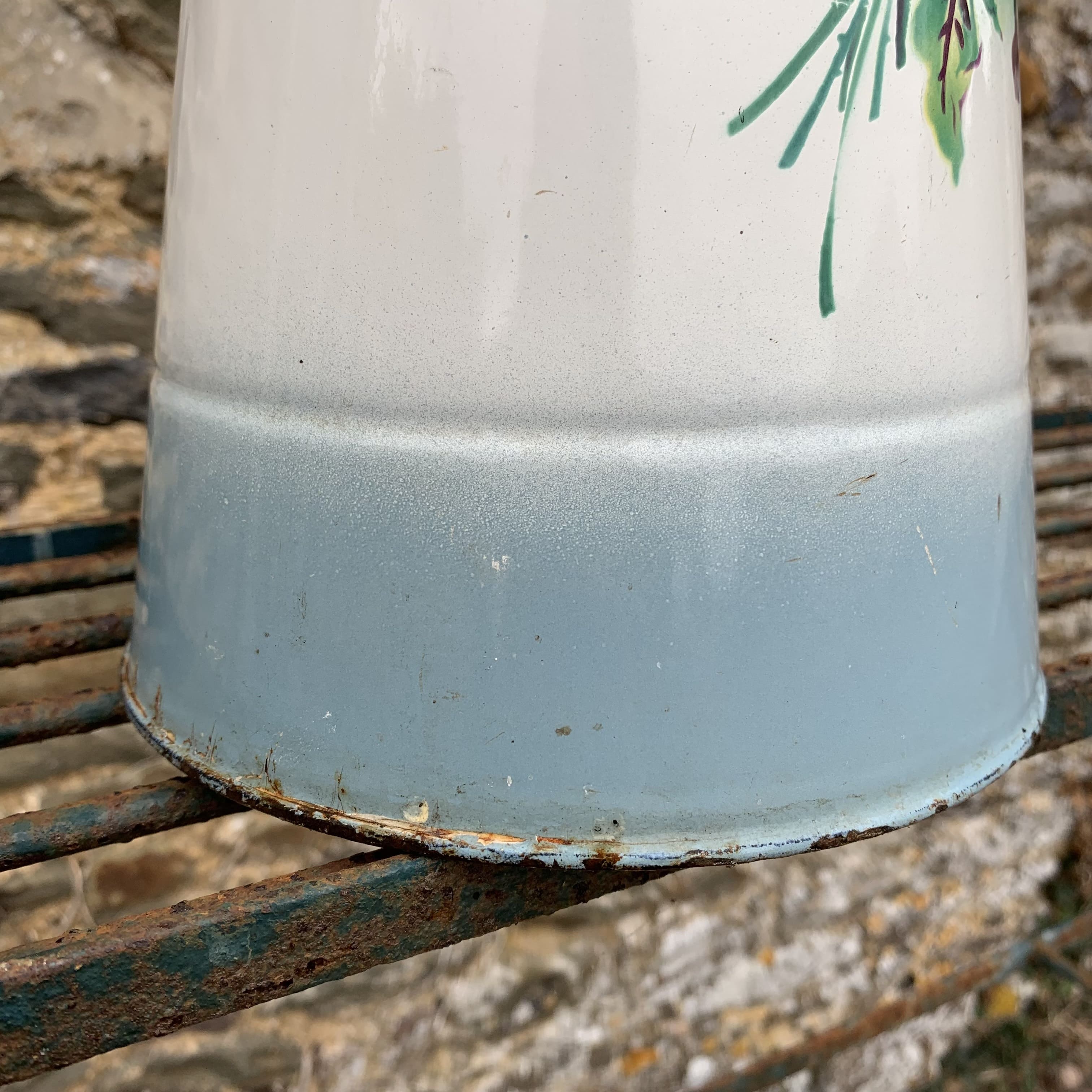 Enamelled broc with floral decoration