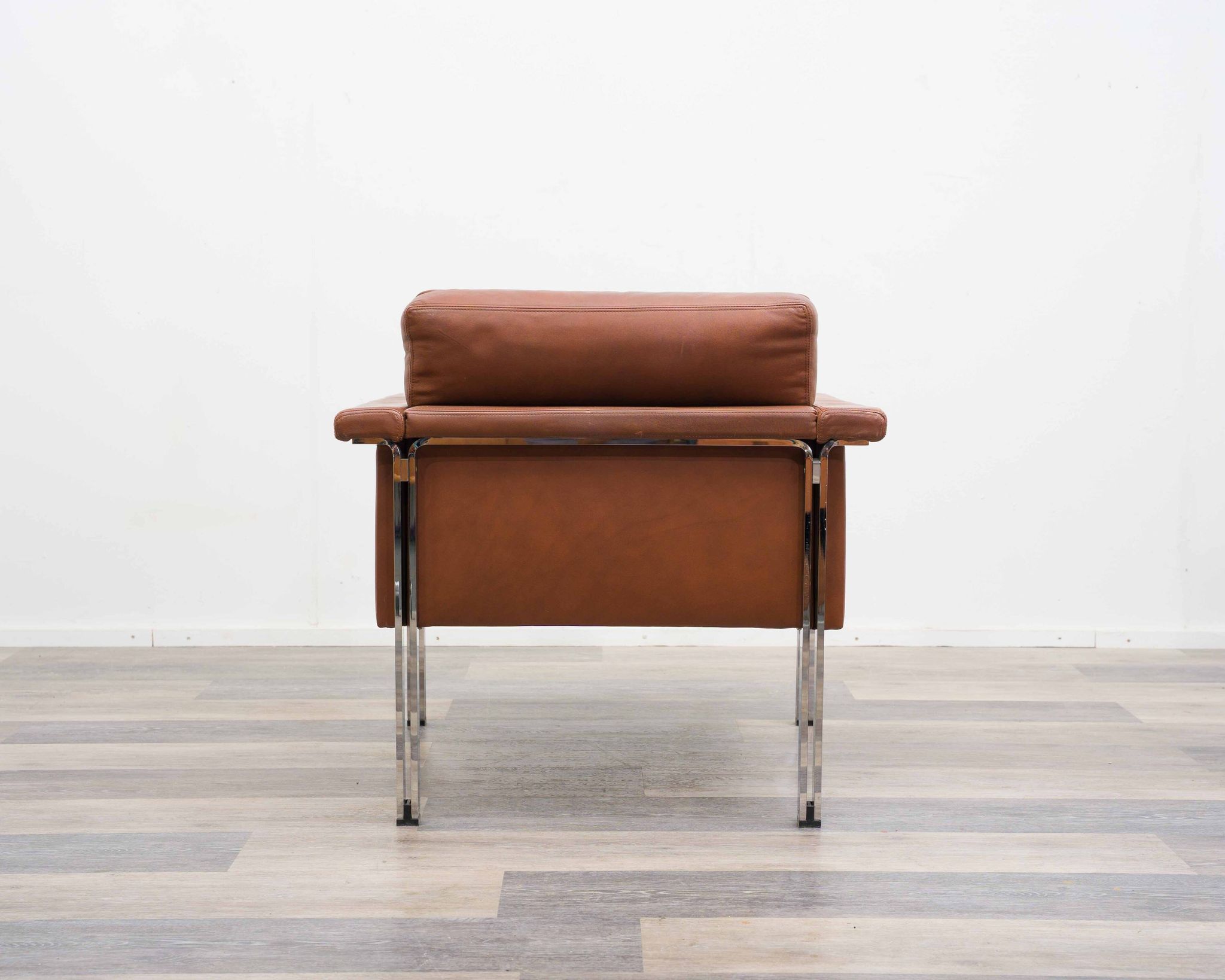 Leather armchair, 1970s, manufacturer Sitag, cognac brown leather.