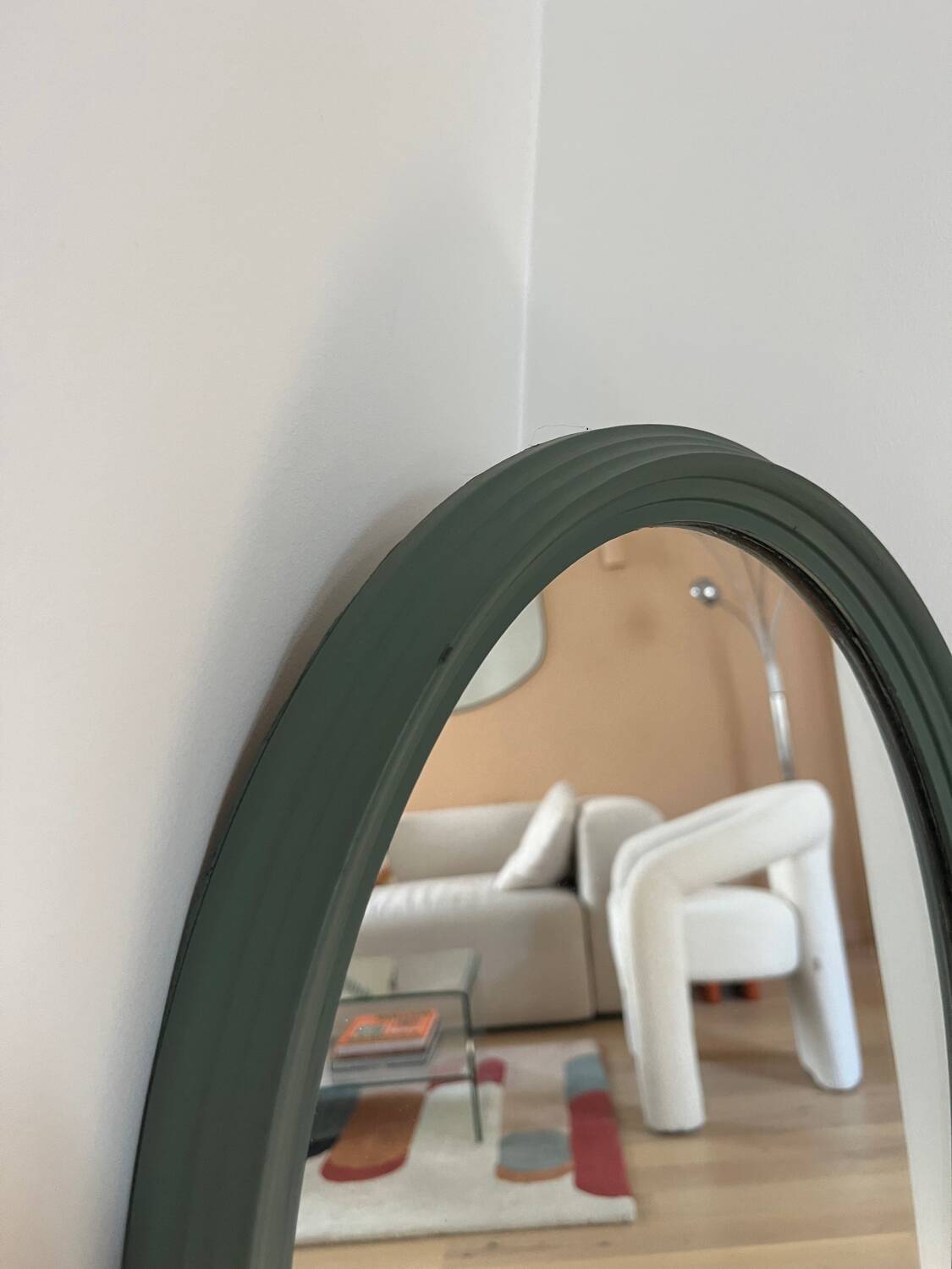 Green oval mirror