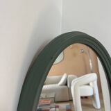 Green oval mirror