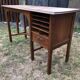 Old oak desk with curved wooden sleepers in the Art Nouveau spirit of the early 20th century.