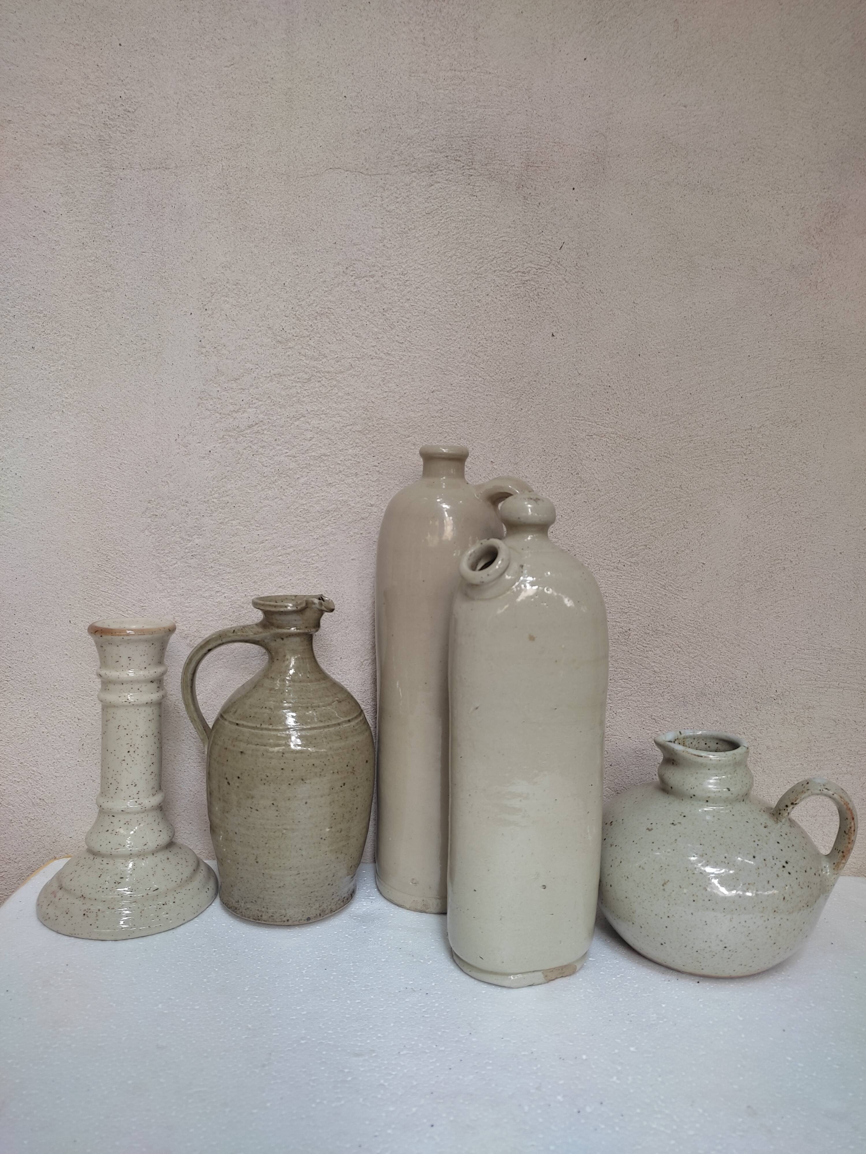 Set of sandstone bottles and pitchers