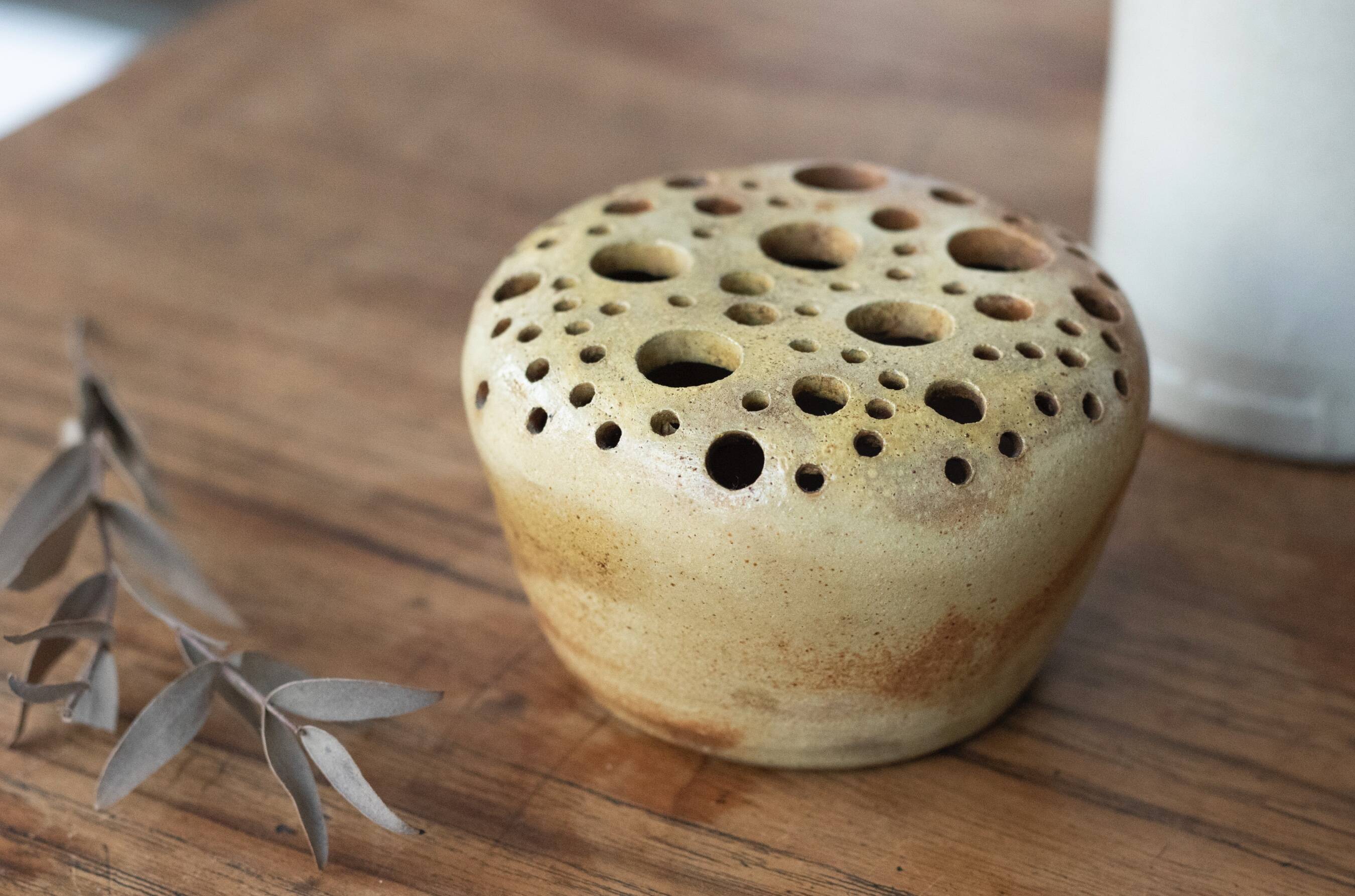 Signed sandstone flower pick