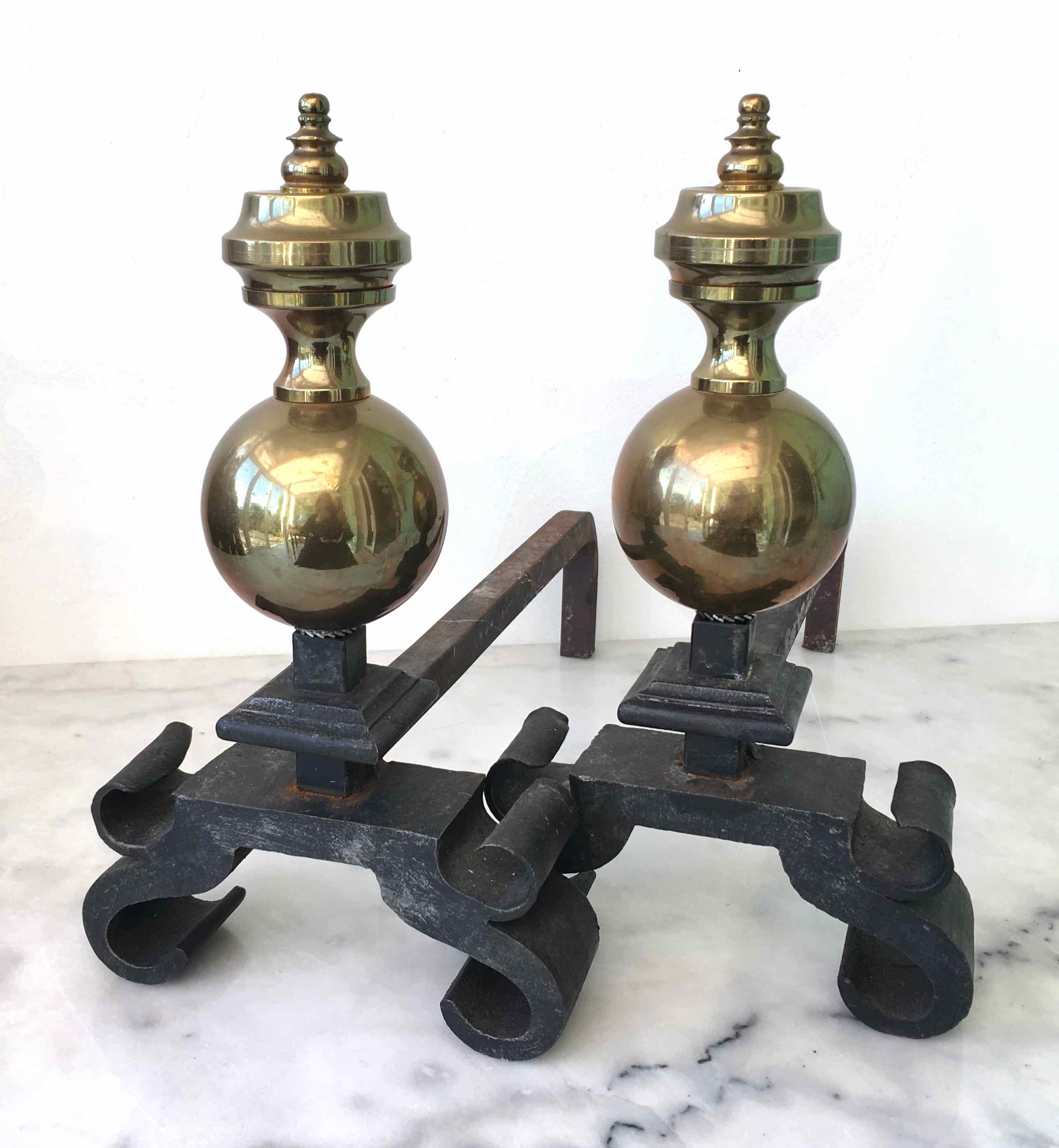 Old cast iron and brass bedside tables