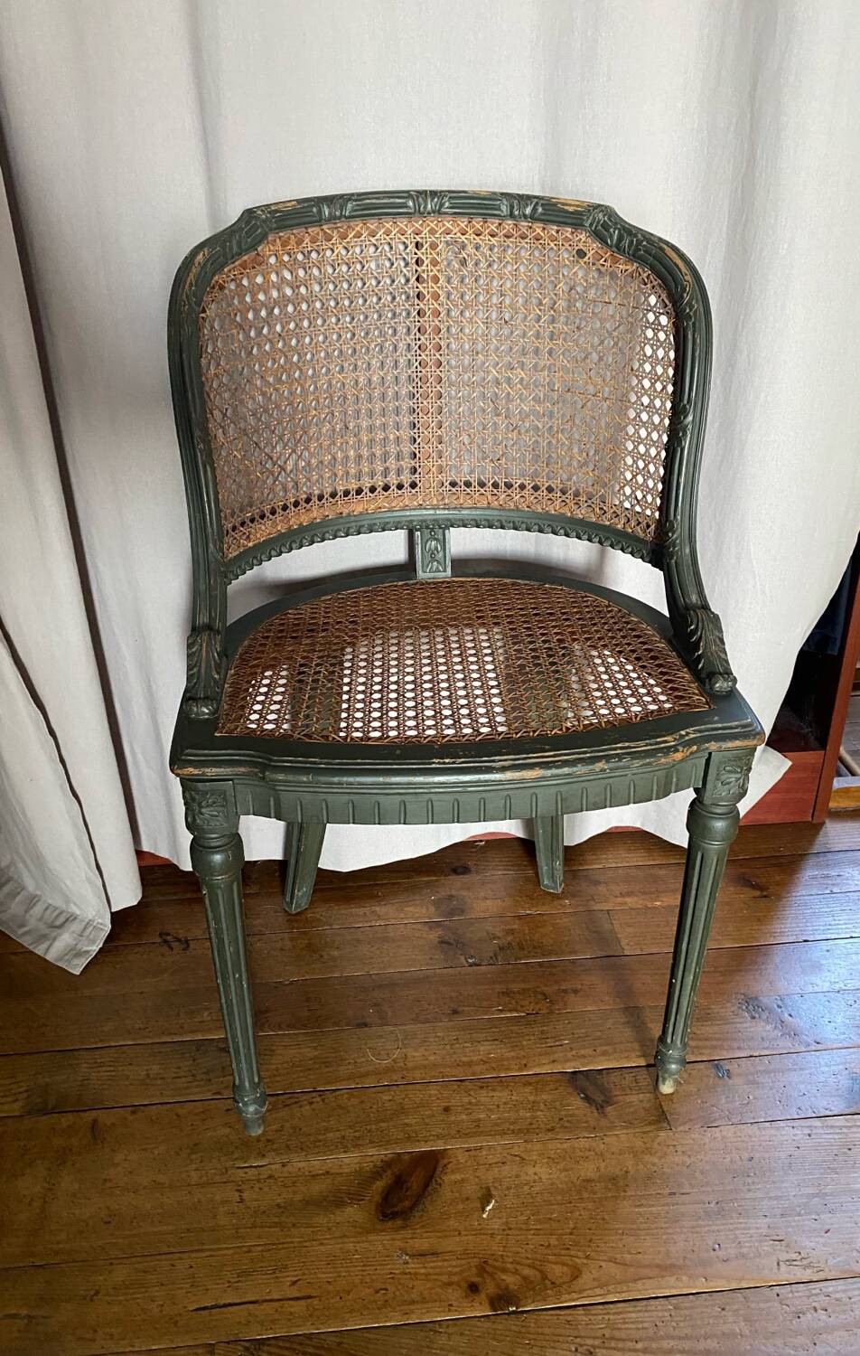 Caned armchair in Louis XVI style