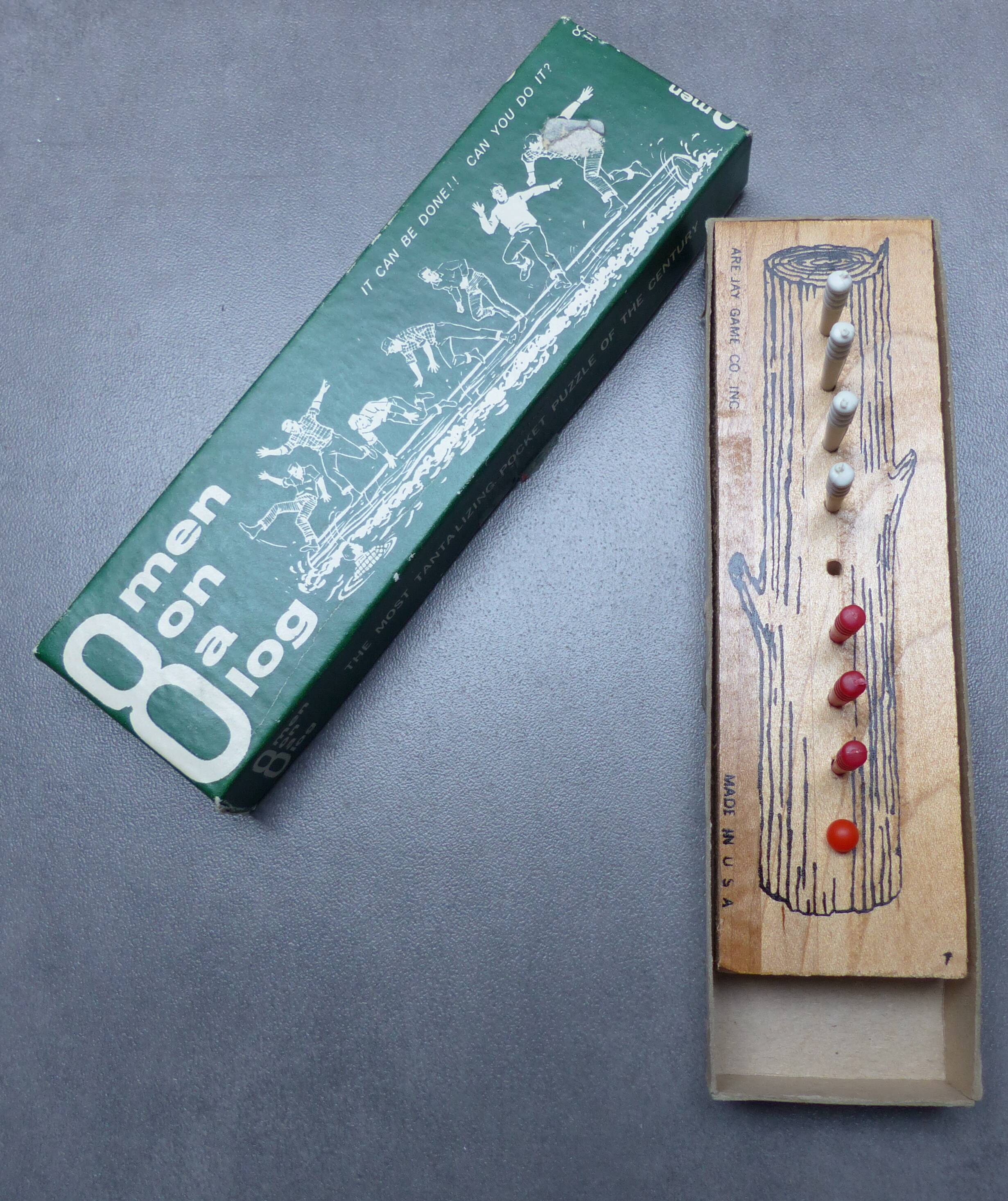 Wooden game "8 men in a log"