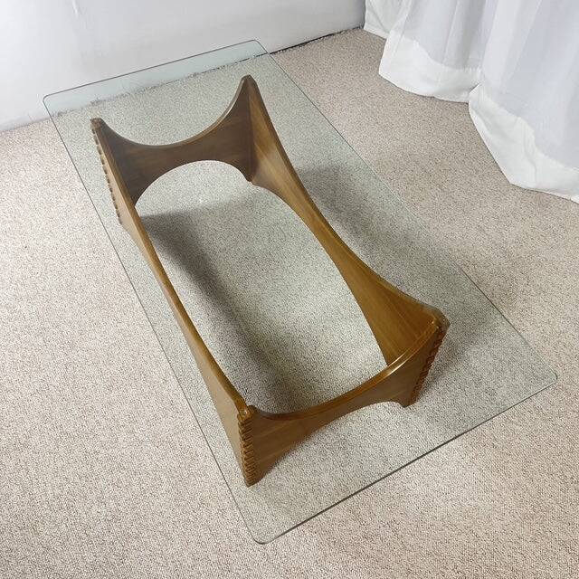 Sculptural coffee table in mahogany and glass – Europe, 1970s