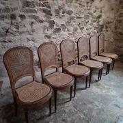 Set of 6 antique Louis XVI style dining chairs with caning.