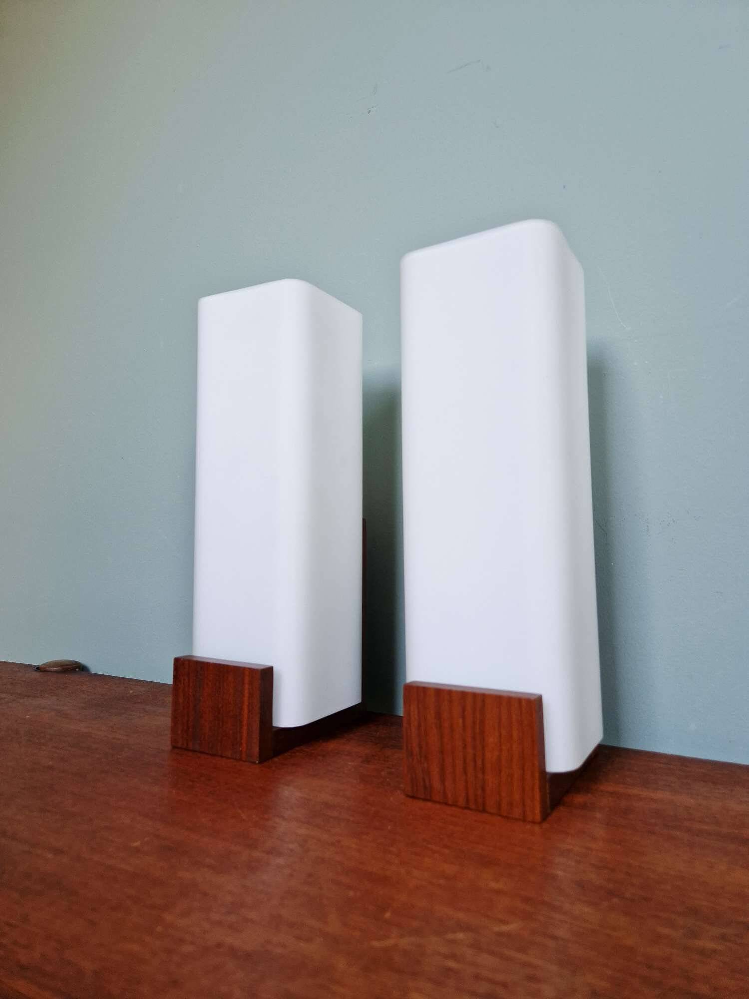 Pair of teak and white opaline wall lights, designed by Louis Kalff, 1960