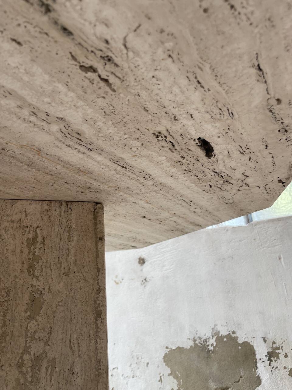 Octagonal travertine coffee table