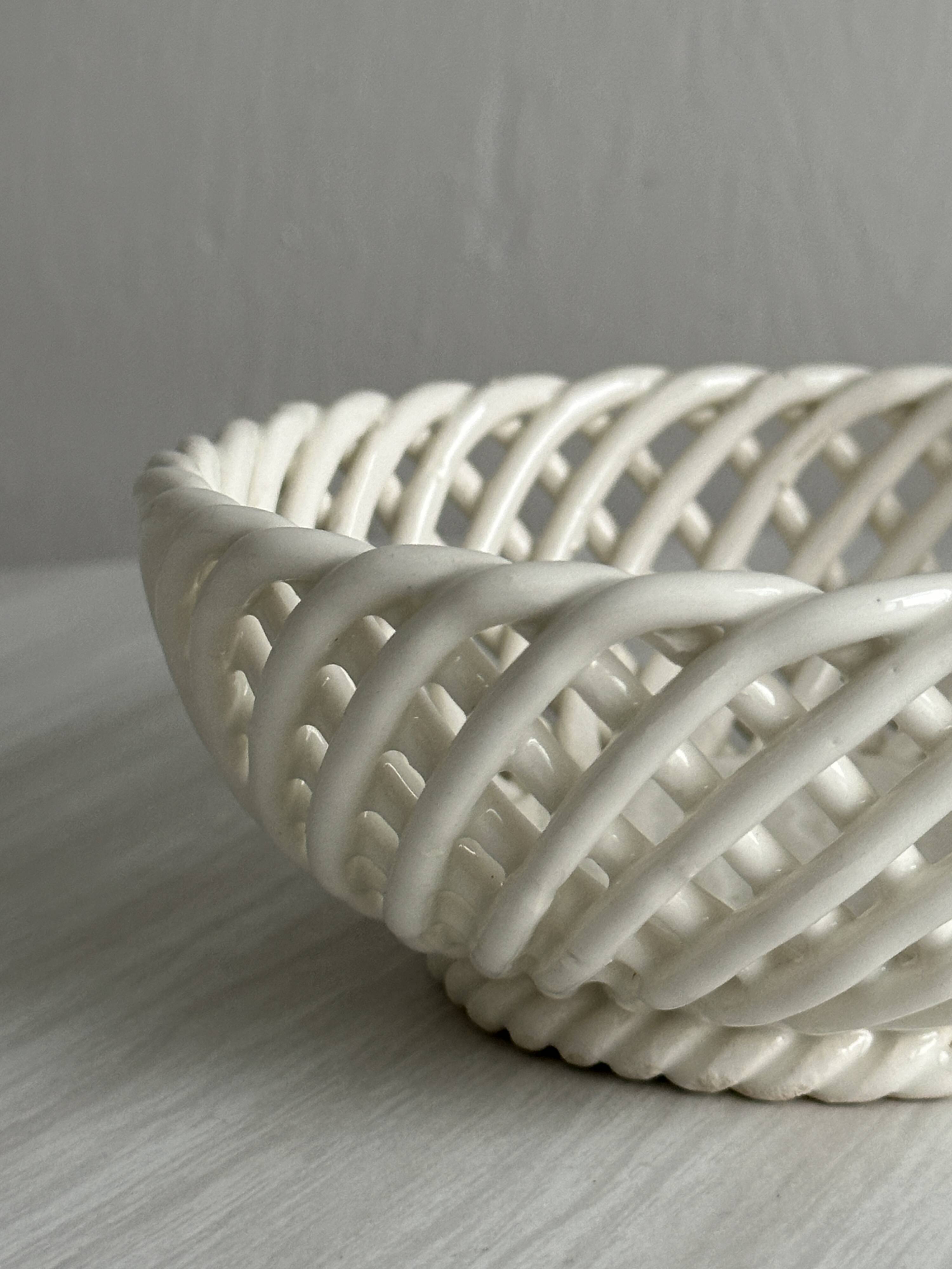 white openwork ceramic cup