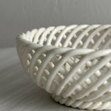 white openwork ceramic cup