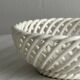 white openwork ceramic cup