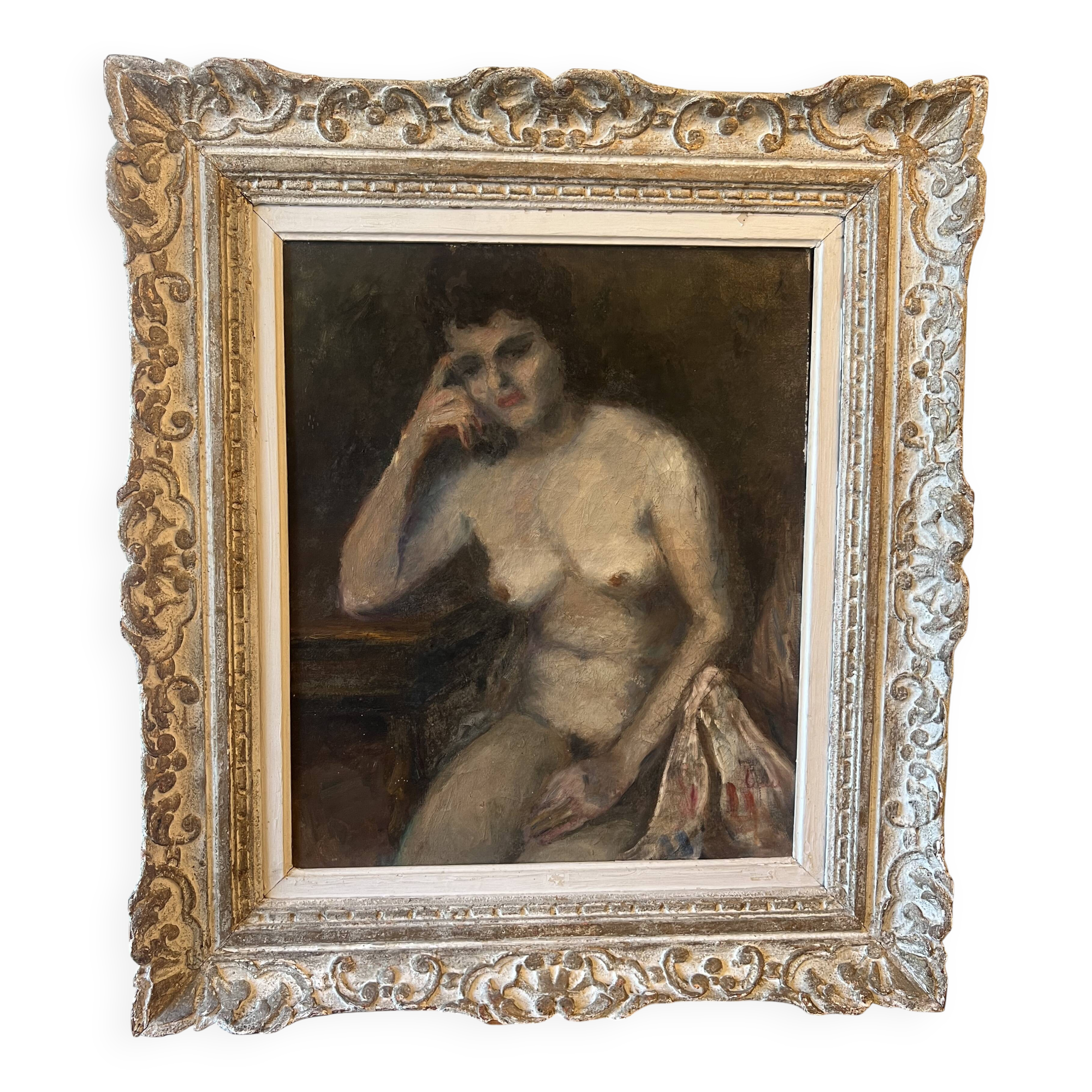 Melancholic female nude, in a sculpted baroque frame