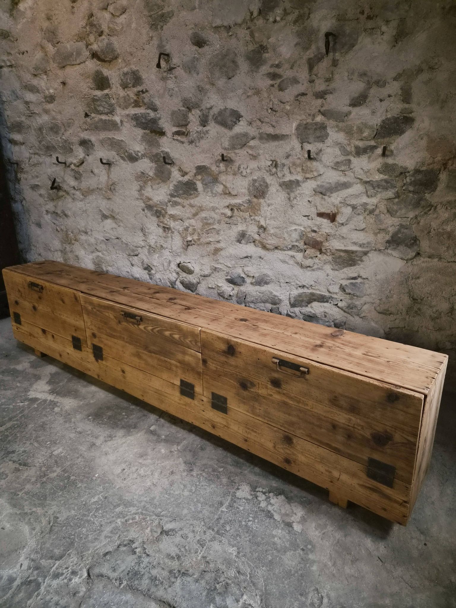 Old French industrial workshop furniture in pine / storage bench, circa 1880–1900
