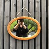 Vintage oval wicker mirror