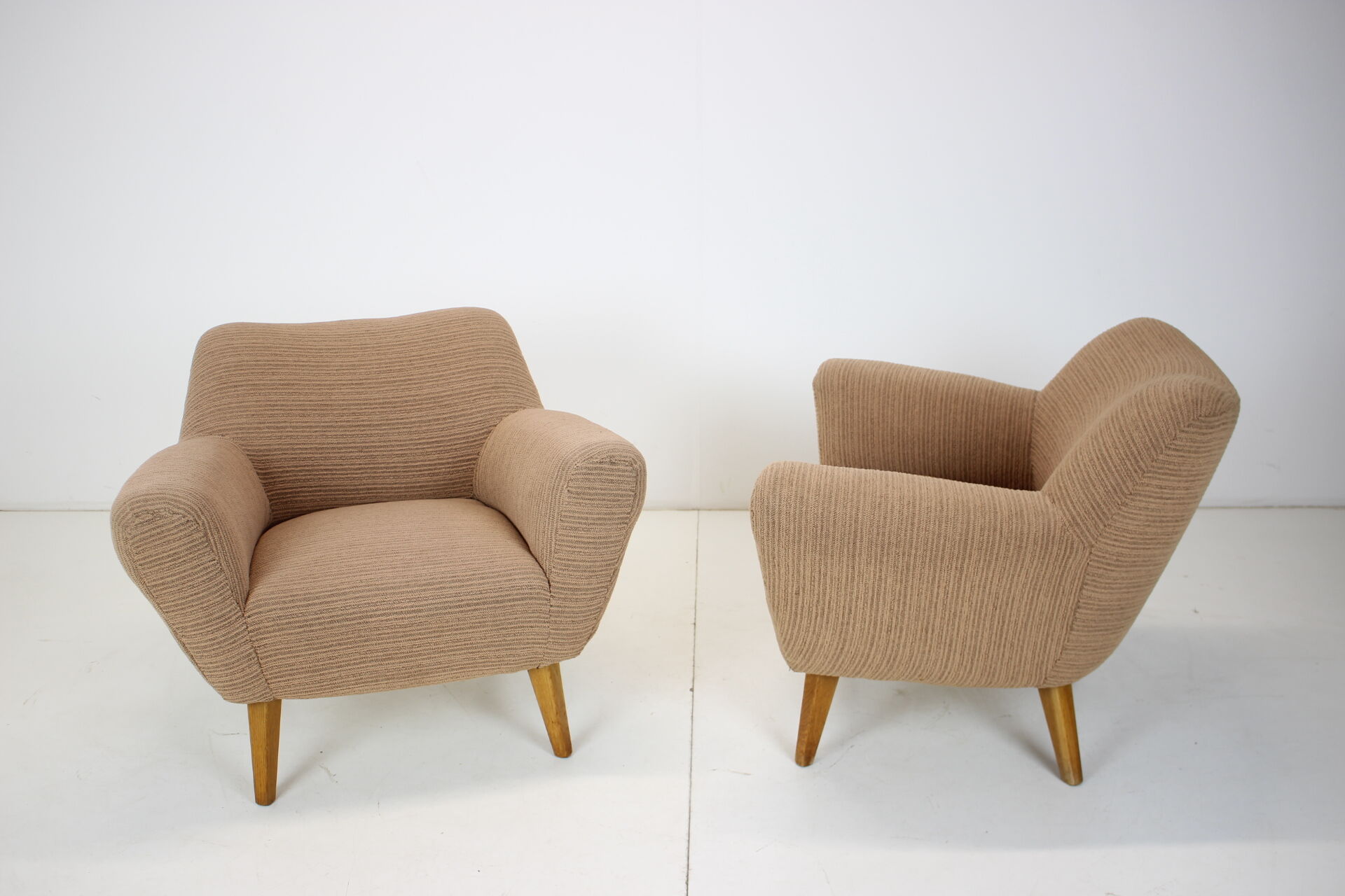 Pair of design club armchairs, 1970's.