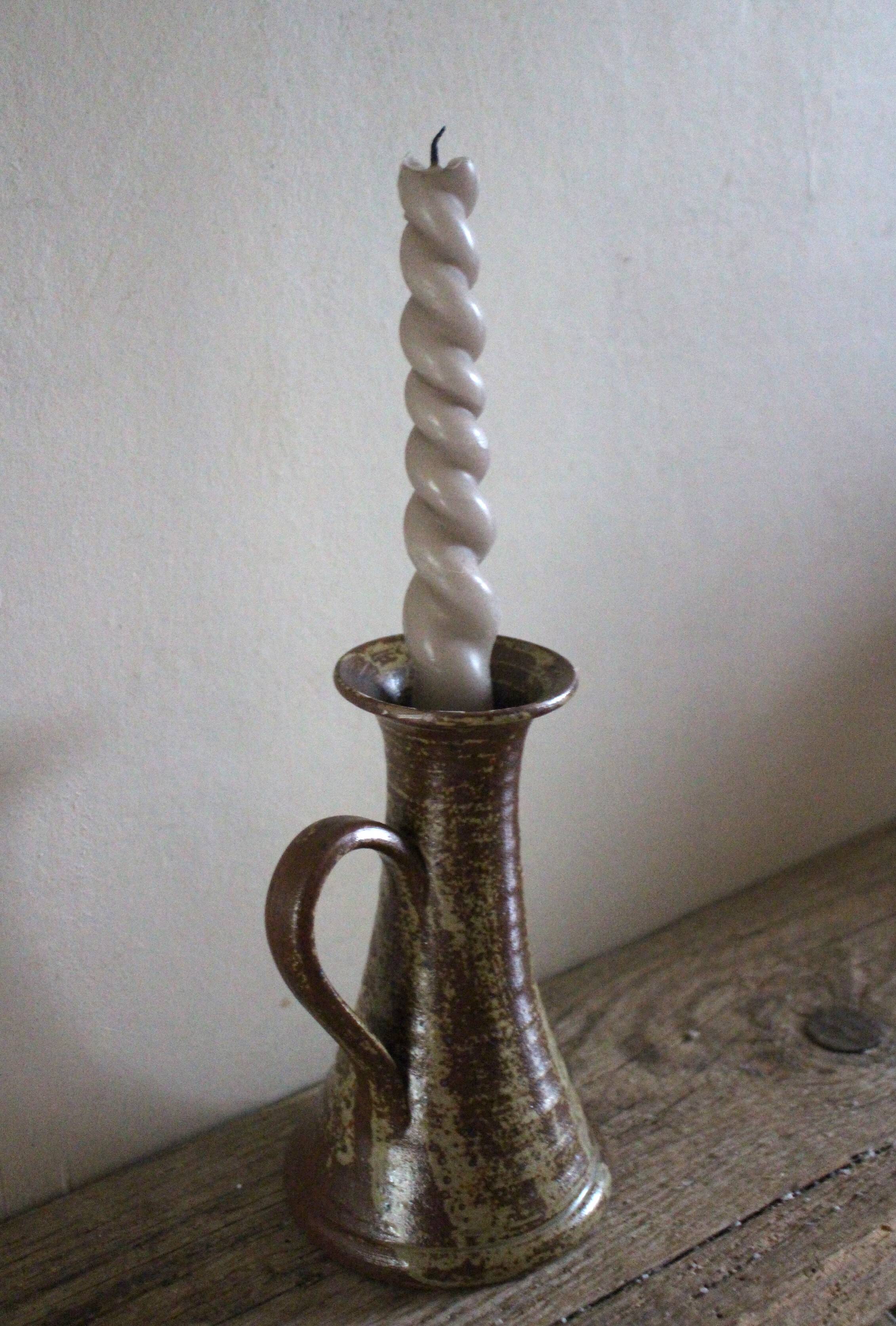 Vintage pyrite-glazed stoneware candlestick with handle