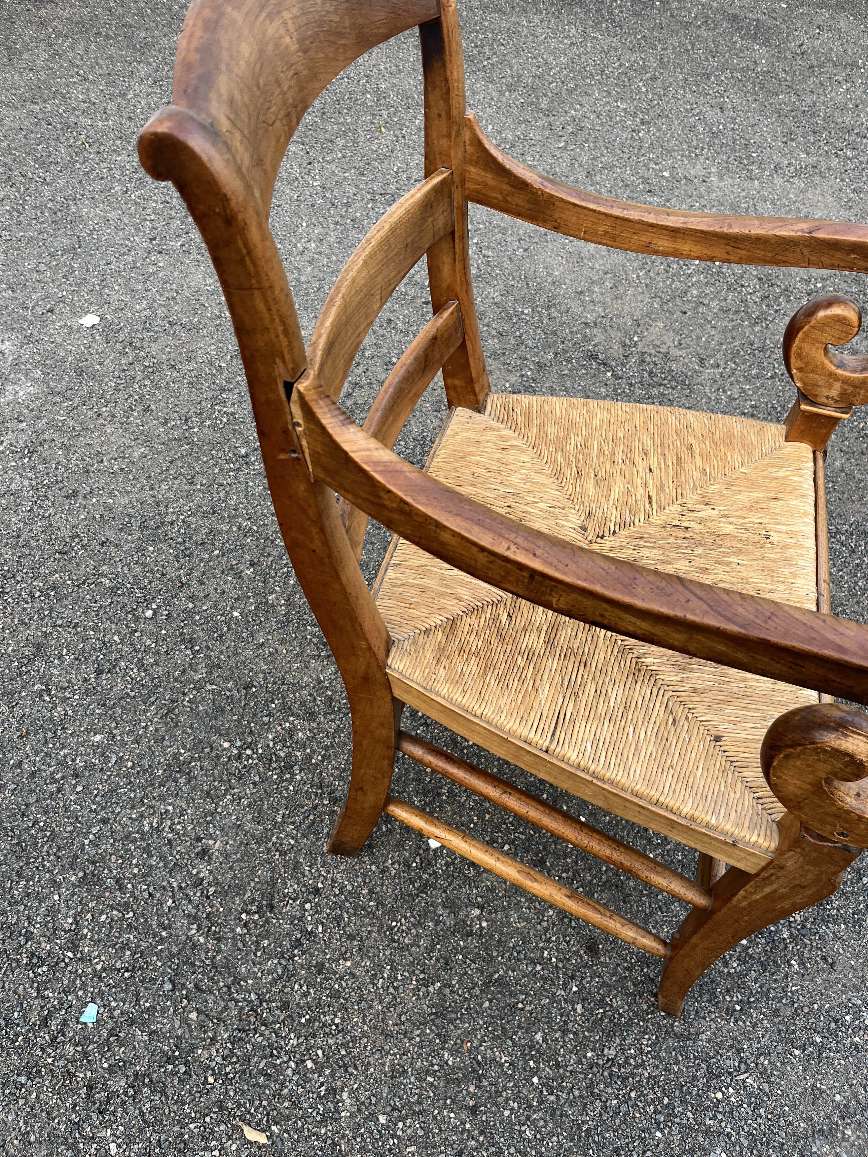 Louis Philippe country armchair in solid wood and straw, hooked armrests