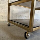 Gold metal and smoked glass serving trolley from the 70s