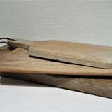 three vintage patinated solid wood cutting boards