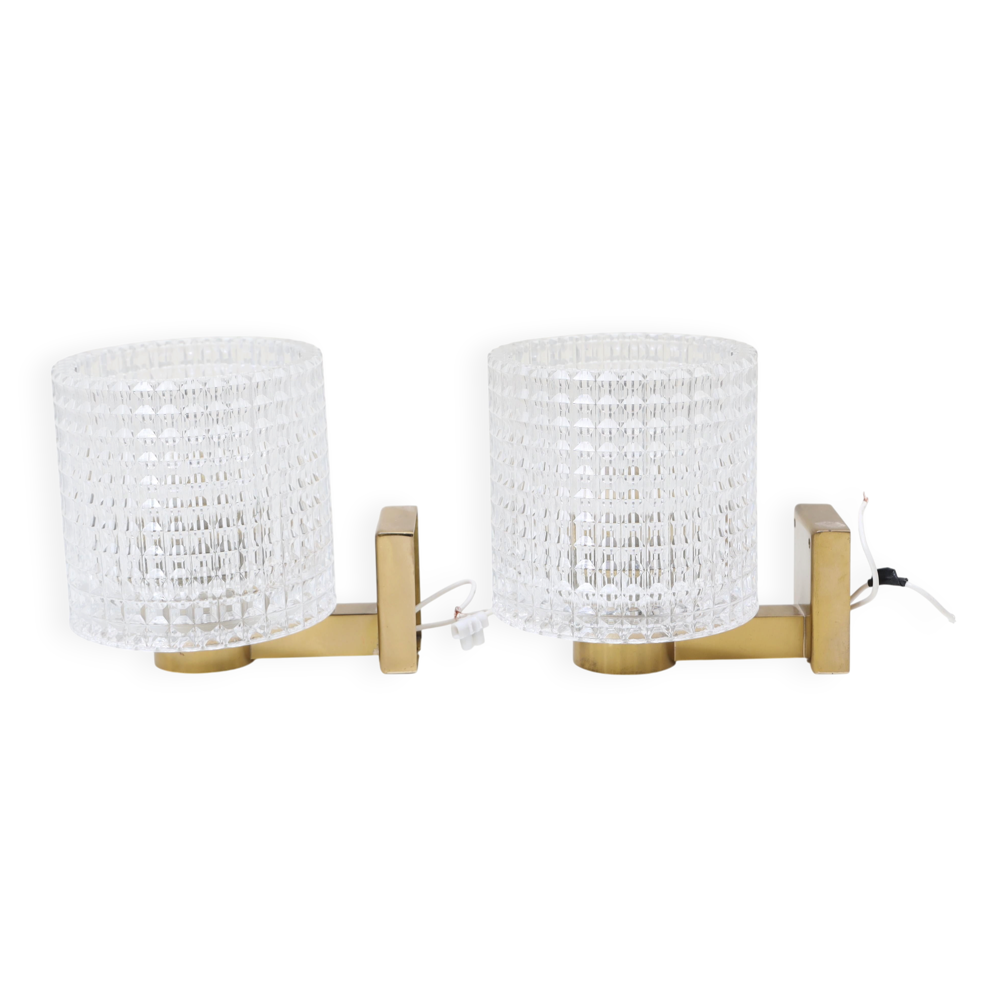 Carl Fagerlund for Orrefors Pair of wall lights in brass and glass Sweden 1960