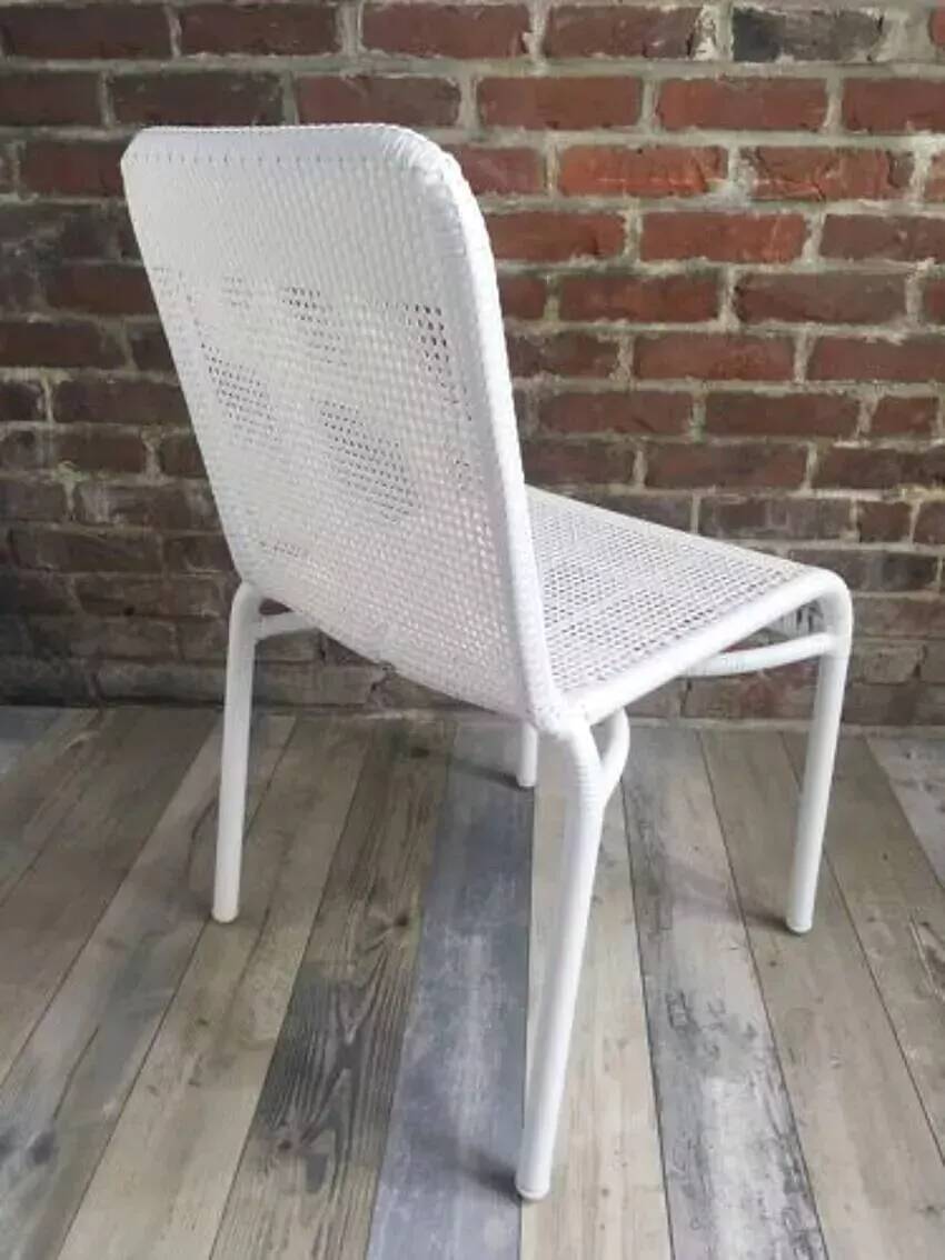 White woven resin garden chair