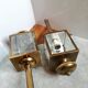 Brass and beveled glass lantern-like wall lamps in brass and beveled glass