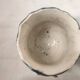 Pot in dabbling floral decoration