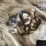 Art Nouveau pocket emptier/Woman with mandolin on vine leaves in spelter