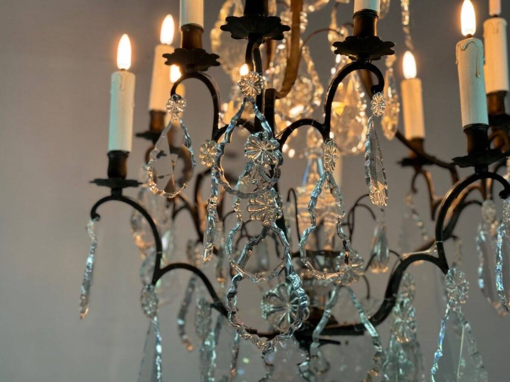 Black patinated bronze cage chandelier decorated with cut crystal pendants circa 1900