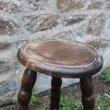 Tripod stool with bossed feet