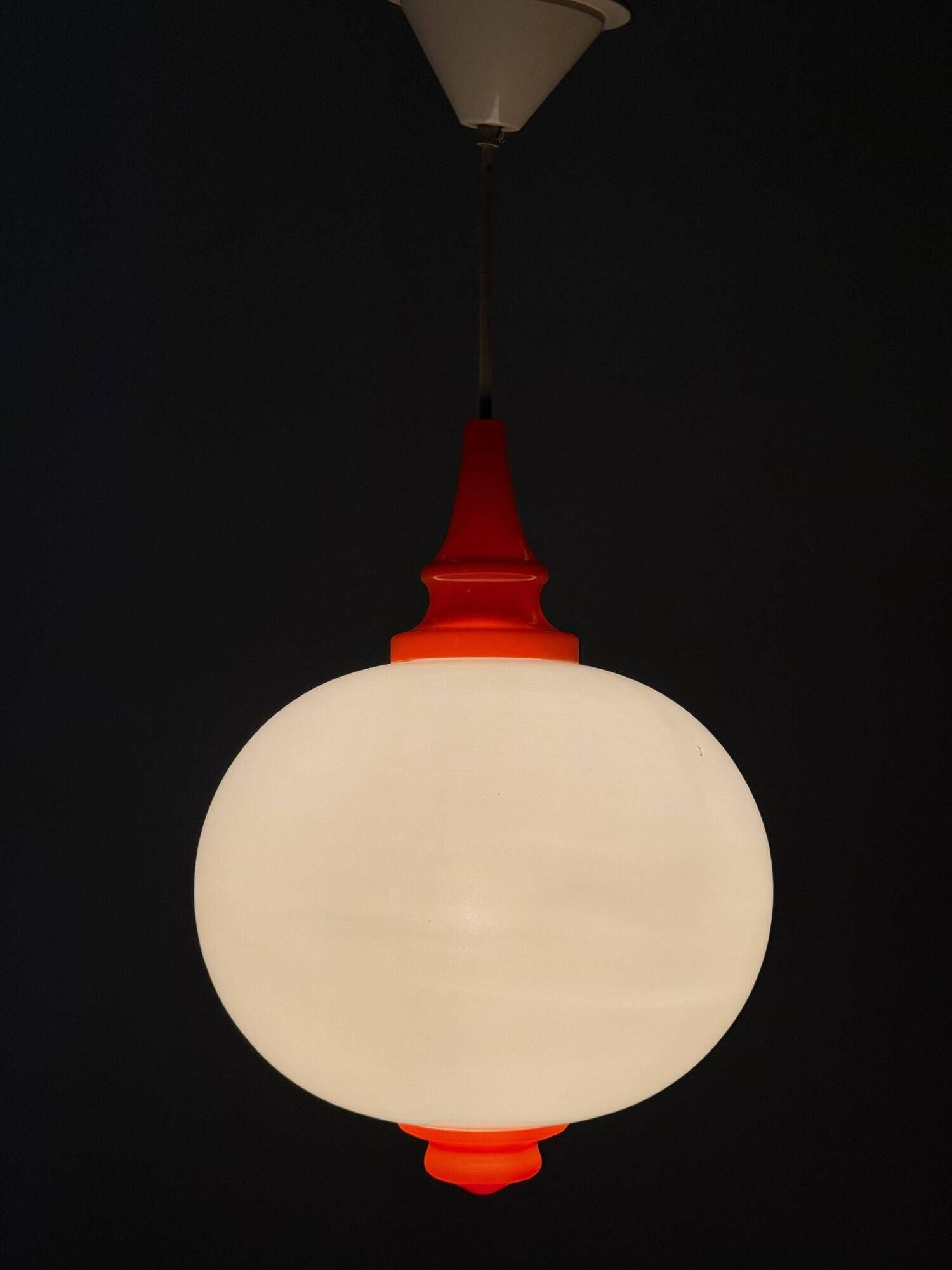 Space Age pendant lamp with milk glass ball and orange accents