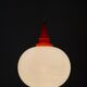 Space Age pendant lamp with milk glass ball and orange accents