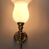 Golden brass wall light from the 1950s.