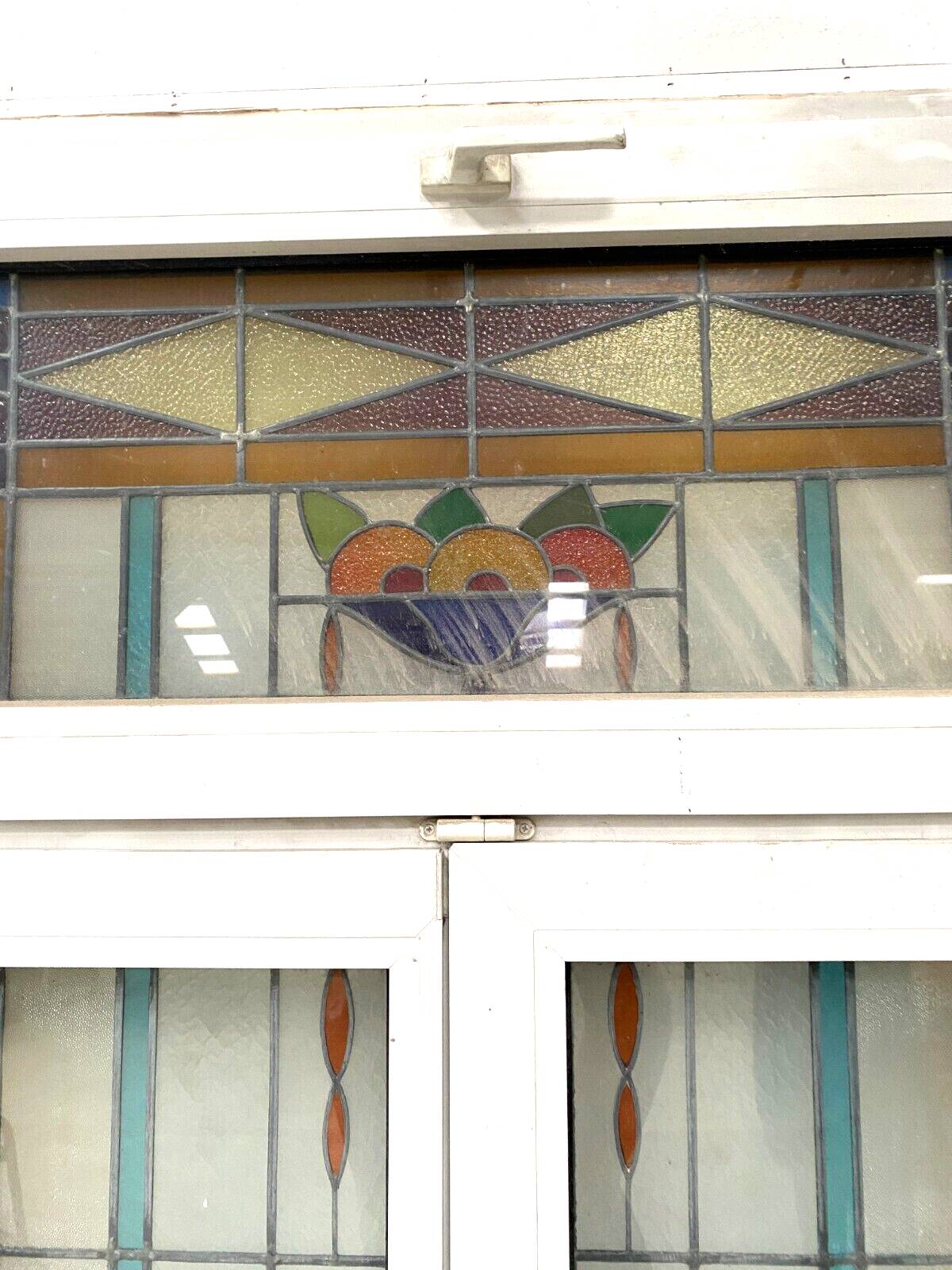 Pair of two-leaf windows in 20th century Art Deco stained glass