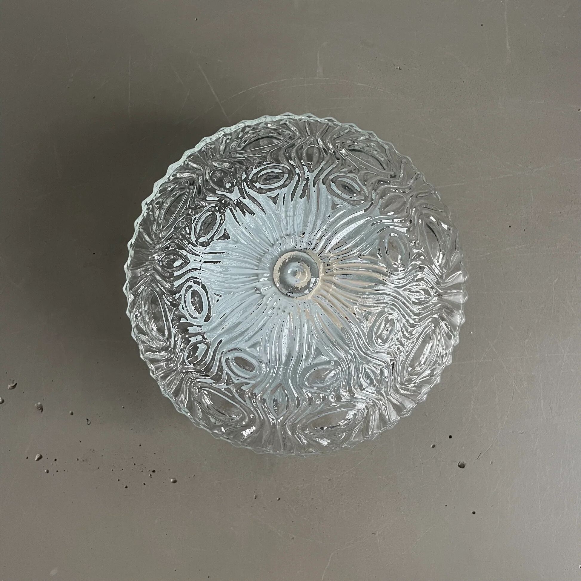 Ceiling light or wall light in moulded convex glass.