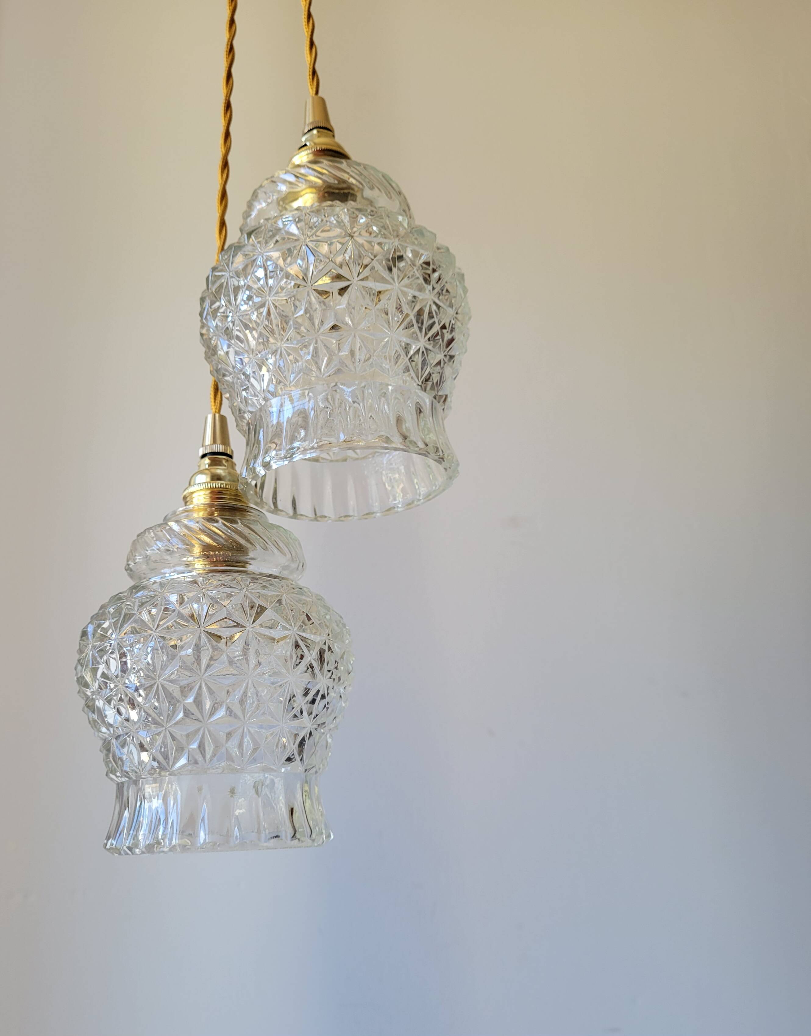 Duo of molded glass pendant lights